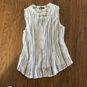 White and black striped sleeveless shirt